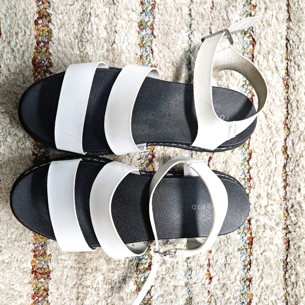 Black and white platform sandels.